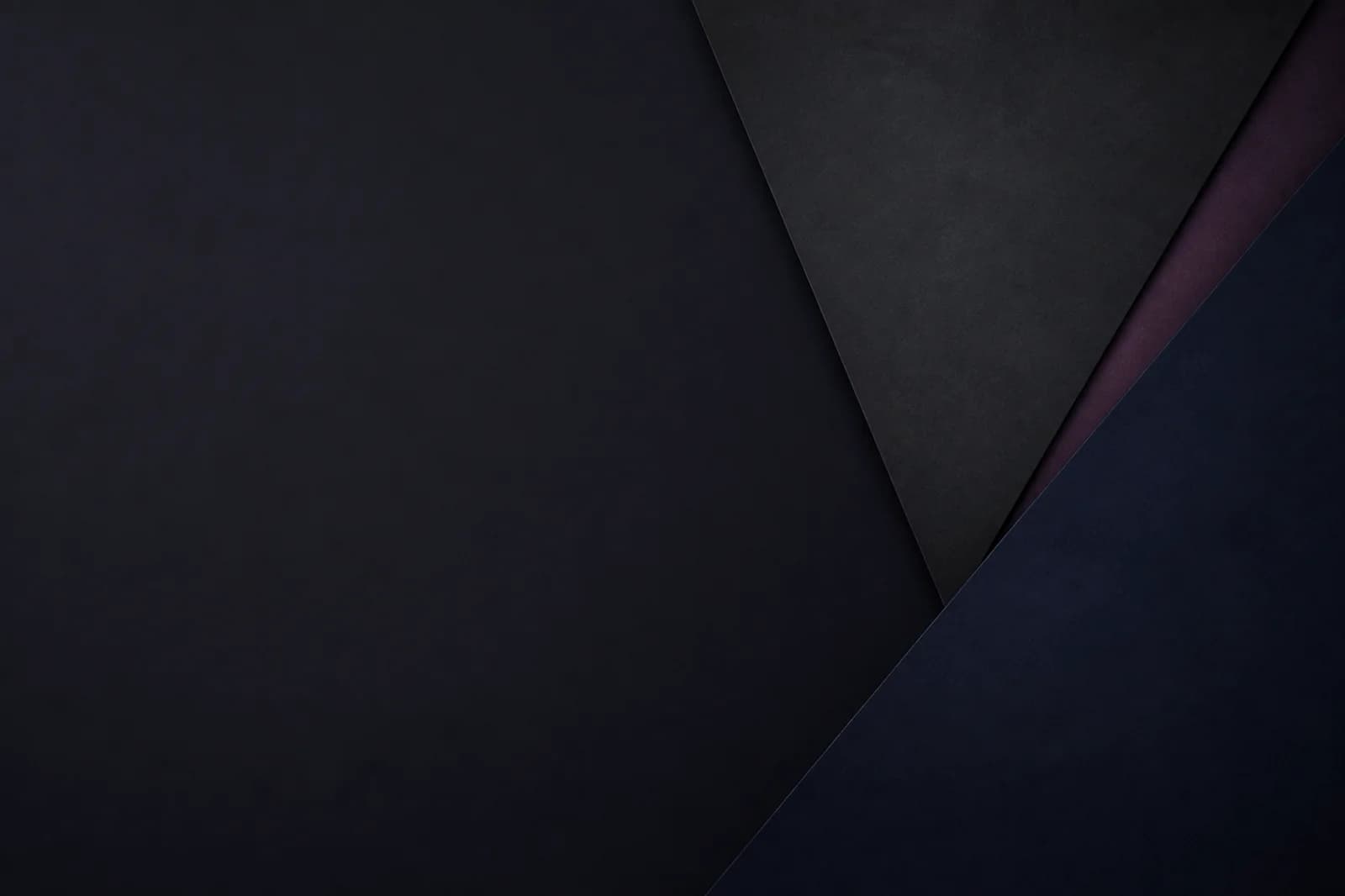 Dark geometric website background with matte midnight planes, subtle plum seam, and generous left text-safe space
